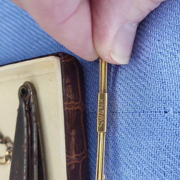 Swank - Picture 4 of 6